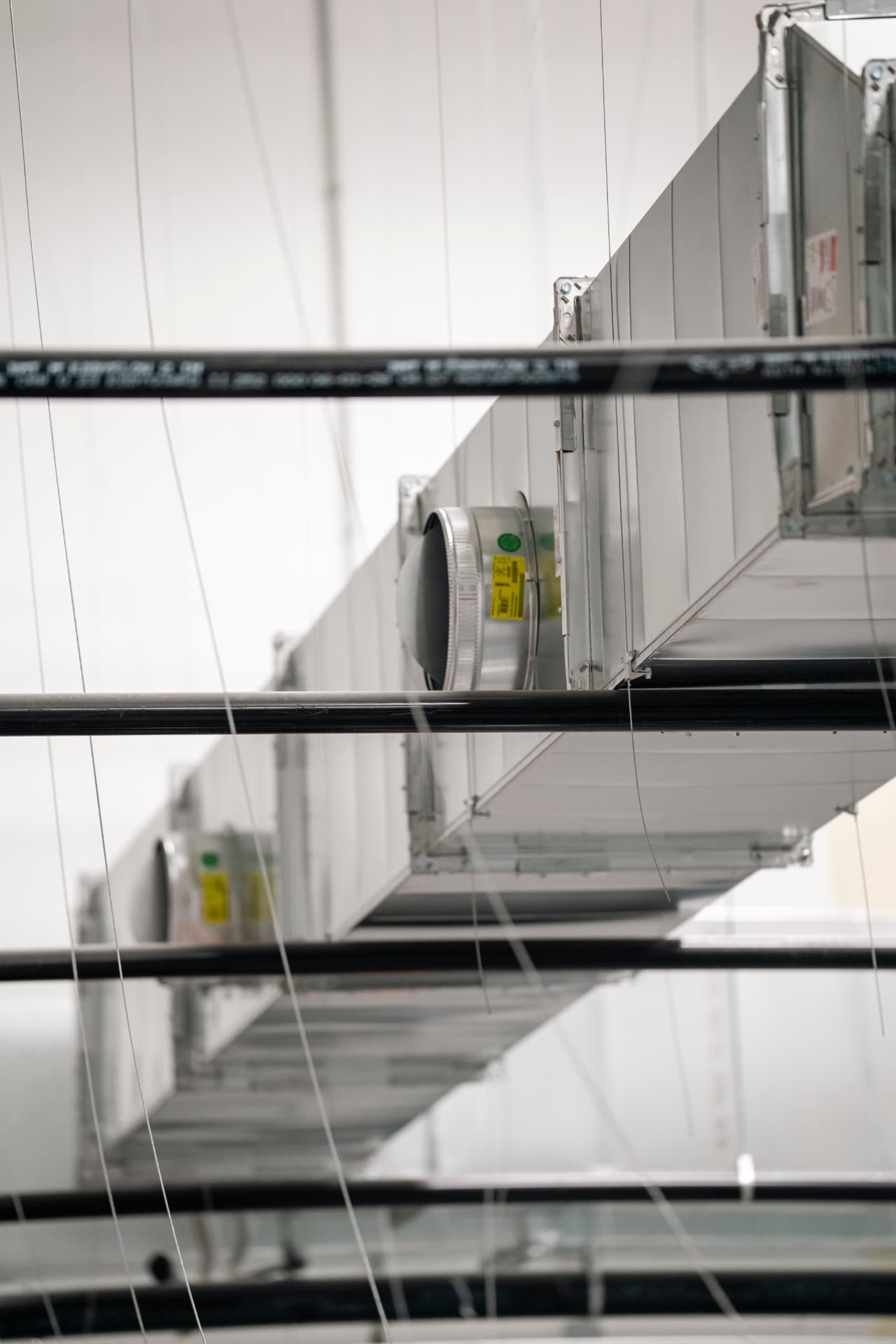 New sheet metal ductwork run above the ceiling of a commercial build-out